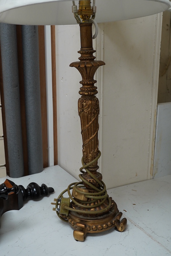 A pair of gilt resin table lamps with white shades, 76cm high. Condition - fair to good.